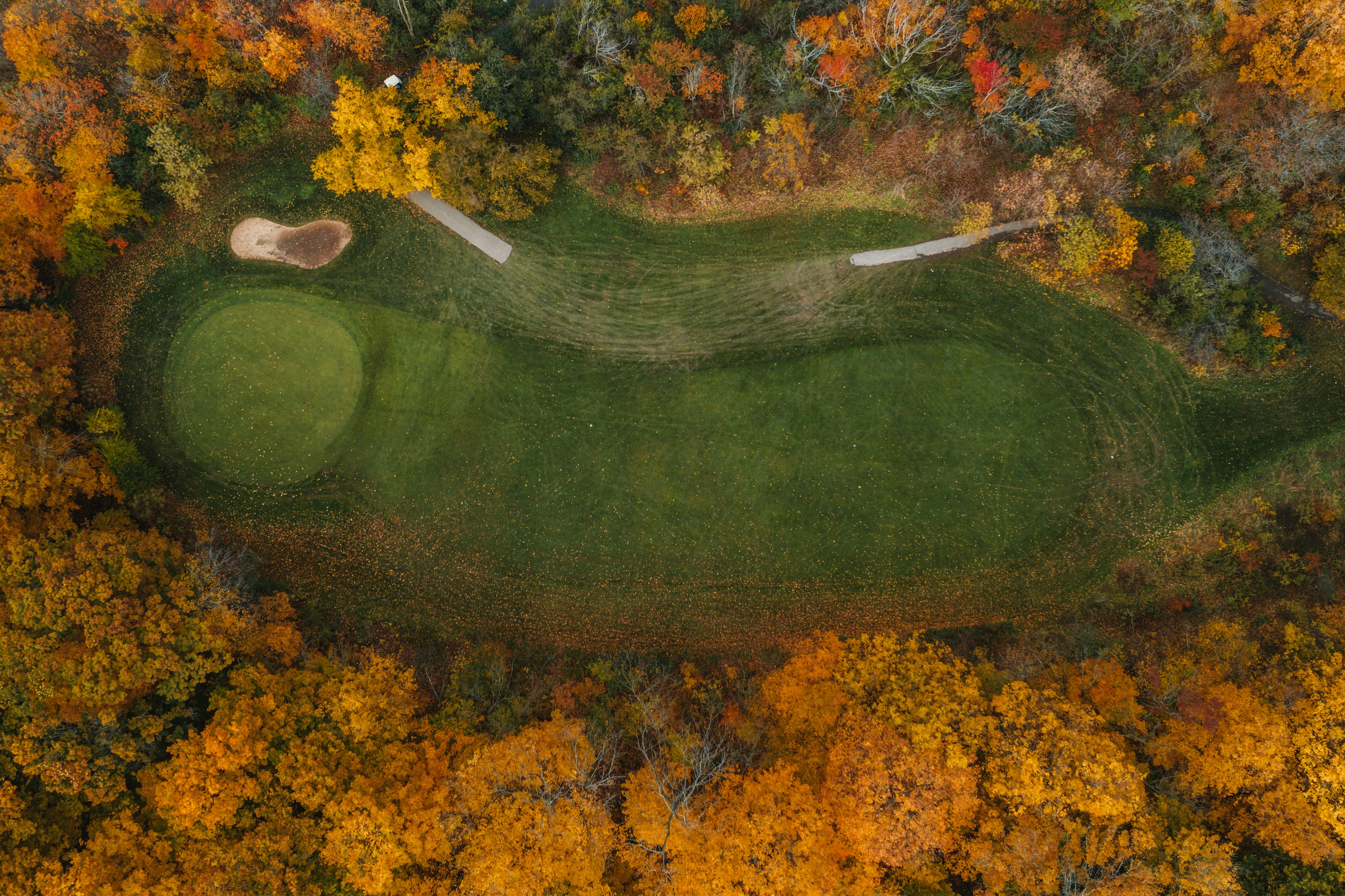 Golf course hole in autumn